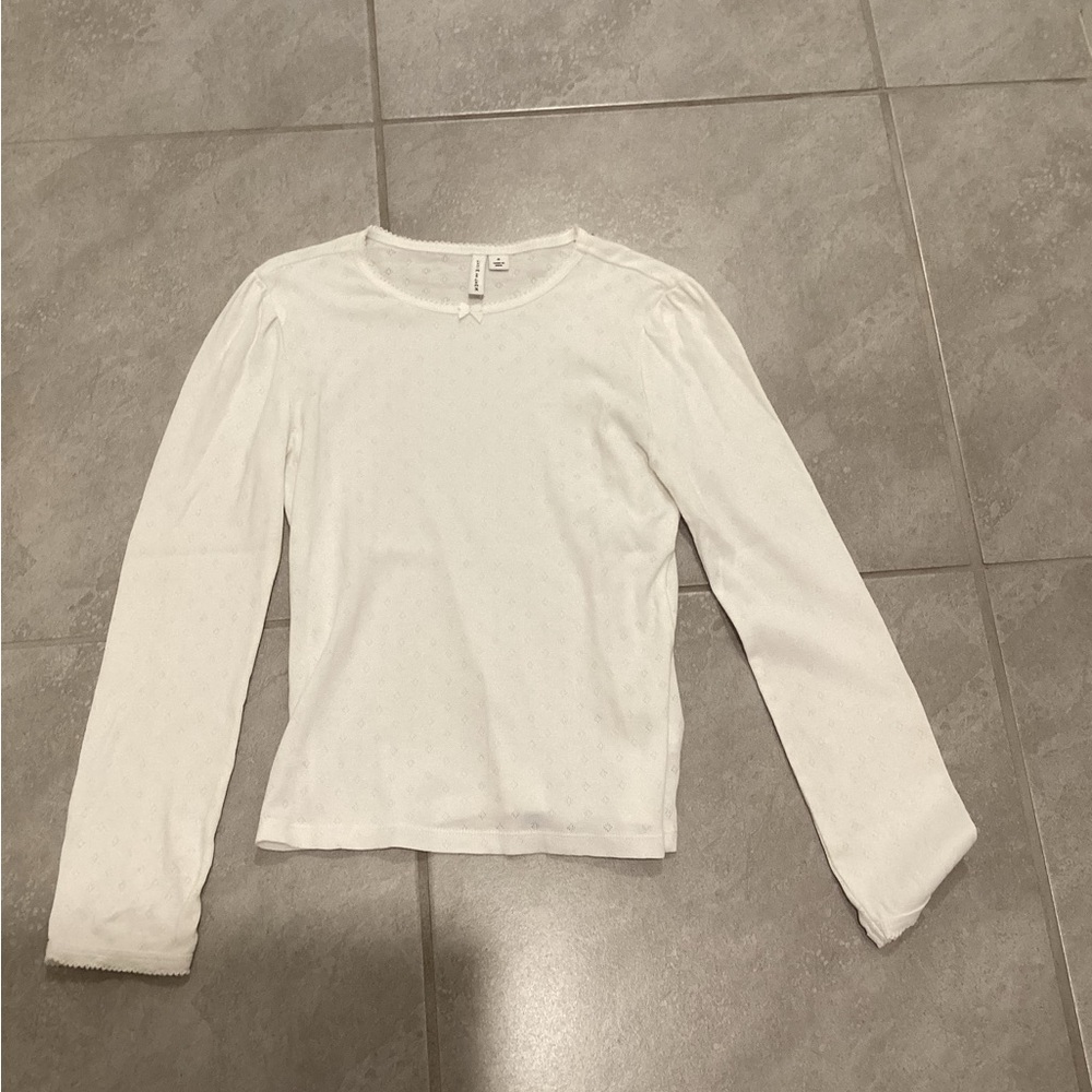 Kids long sleeve white shirt.